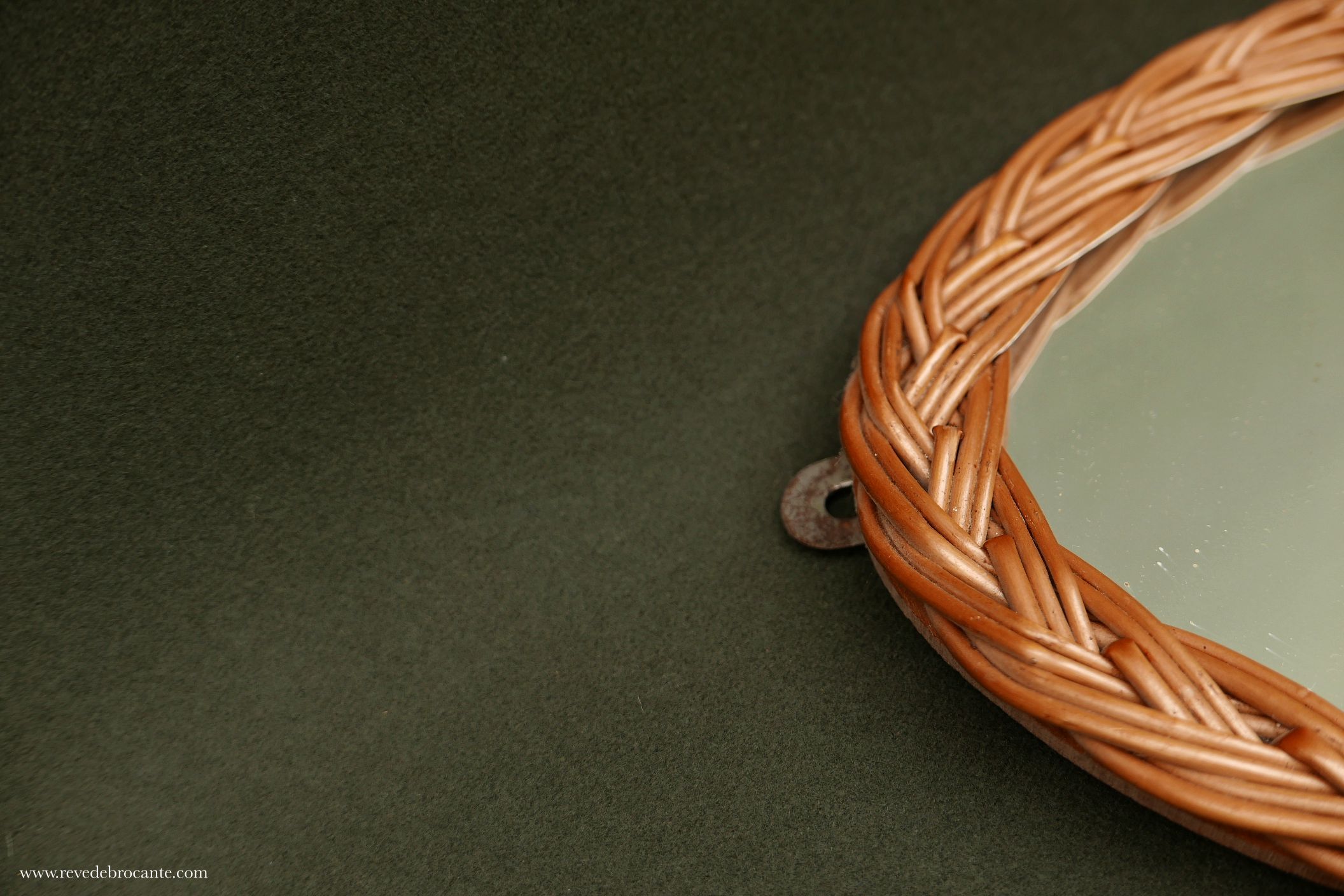 Vintage rattan oval mirror