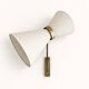 Adjustable wall light in the Maison Lunel style.