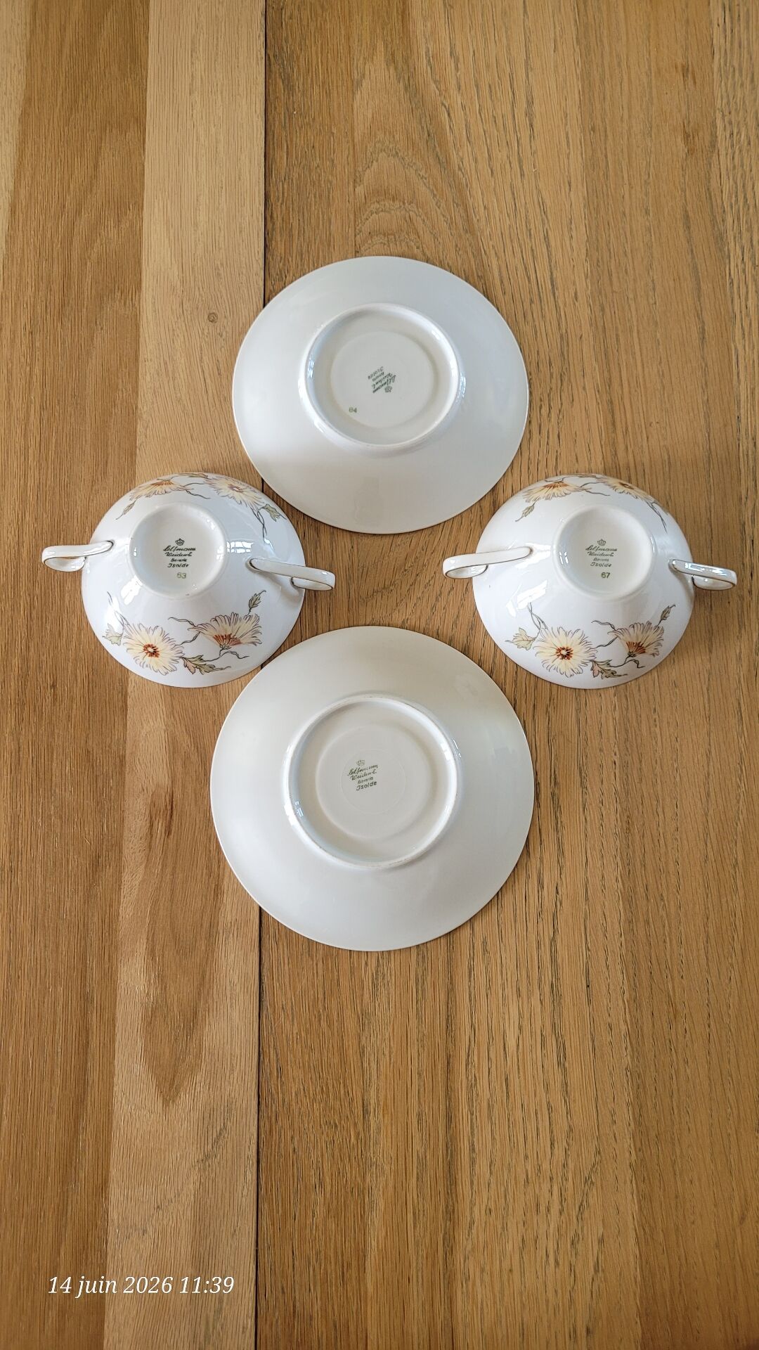 2 large antique cups and their saucers