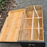 Old wooden trunk with interior compartments