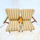 A pair vintage cocktail chairs with stripes and metal screws