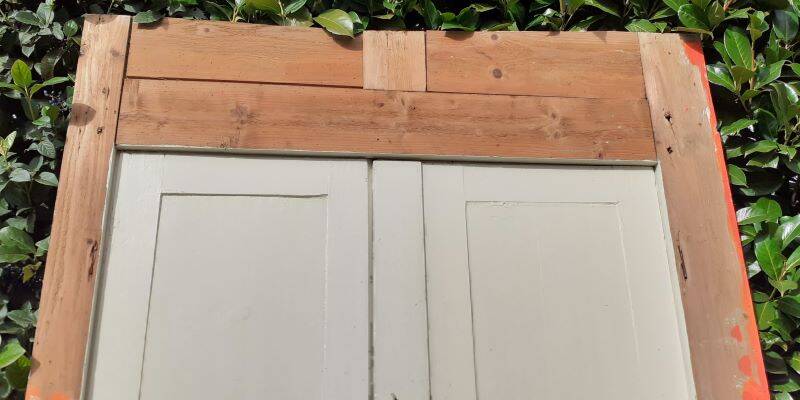 Pair of 19th-century cupboard doors and frame, woodwork