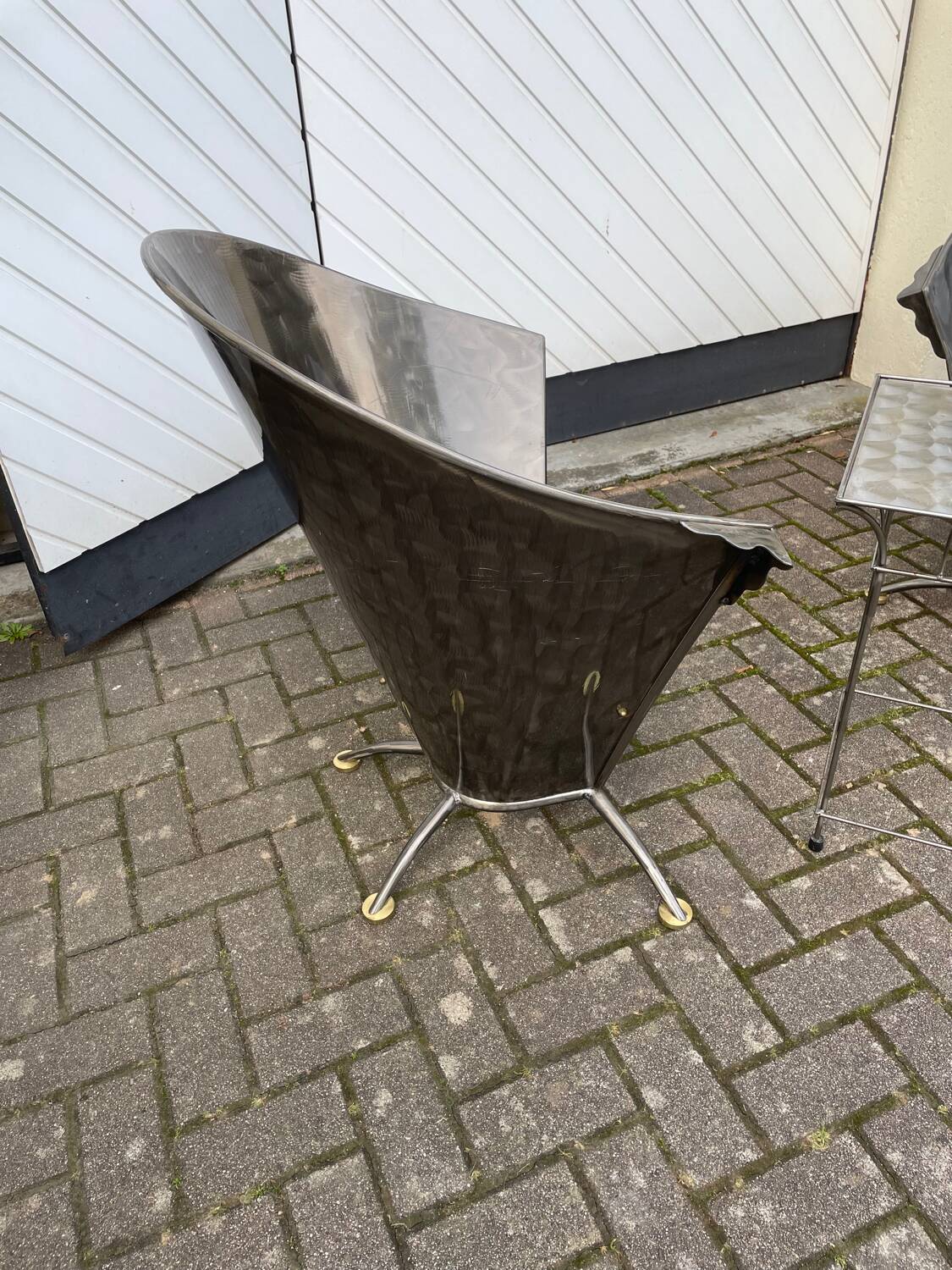 2 cone chairs and a table by Steel-Line