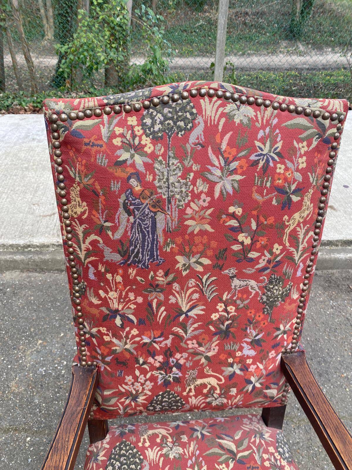 Henri II armchair in solid wood and floral burgundy fabric, 19th century.