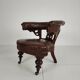 Antique leather armchair by Robson & Son – carved wood & castors, Newcastle