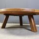 Large tripod round wooden brutalist coffee table, 1960s