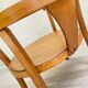 Old armchair for children in wood