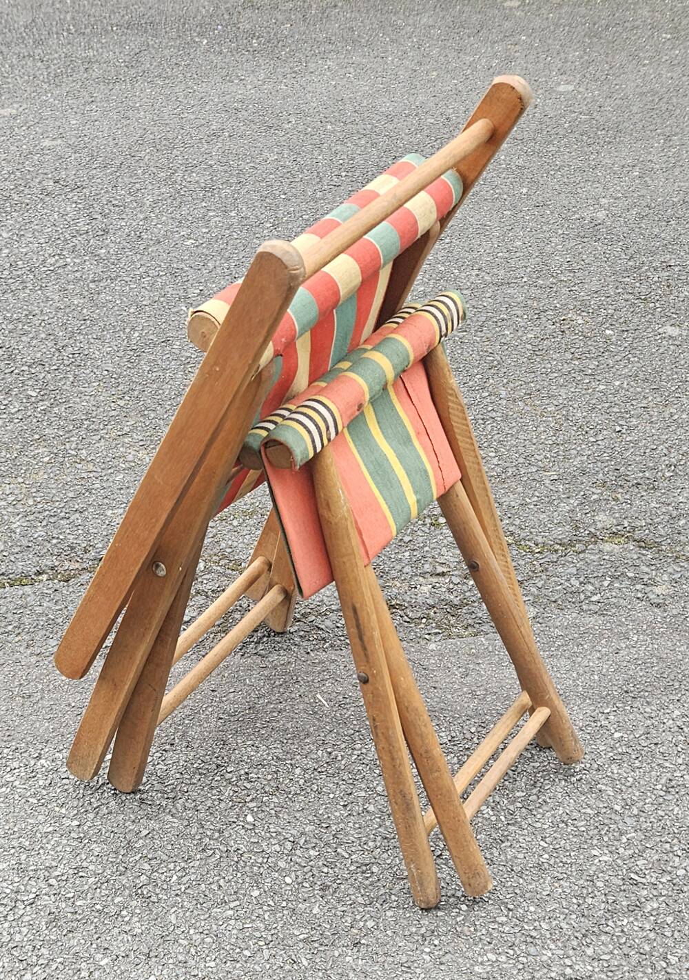 Folding canvas chair with stool, 1950s.