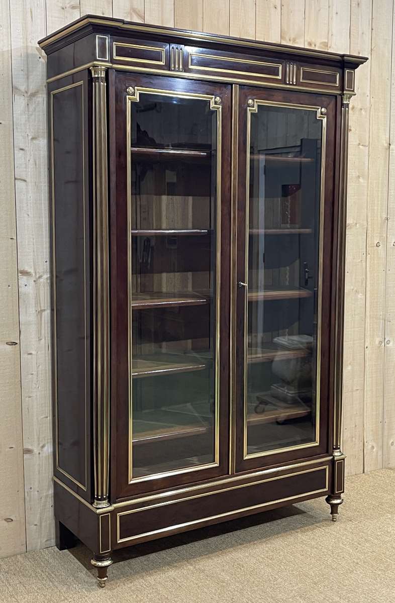 Napoleon III library in mahogany and brass fillet