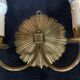 Paire d'appliques soleil en bronze Maison Charles