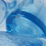 Four Biot glass mugs blue bubbled glass