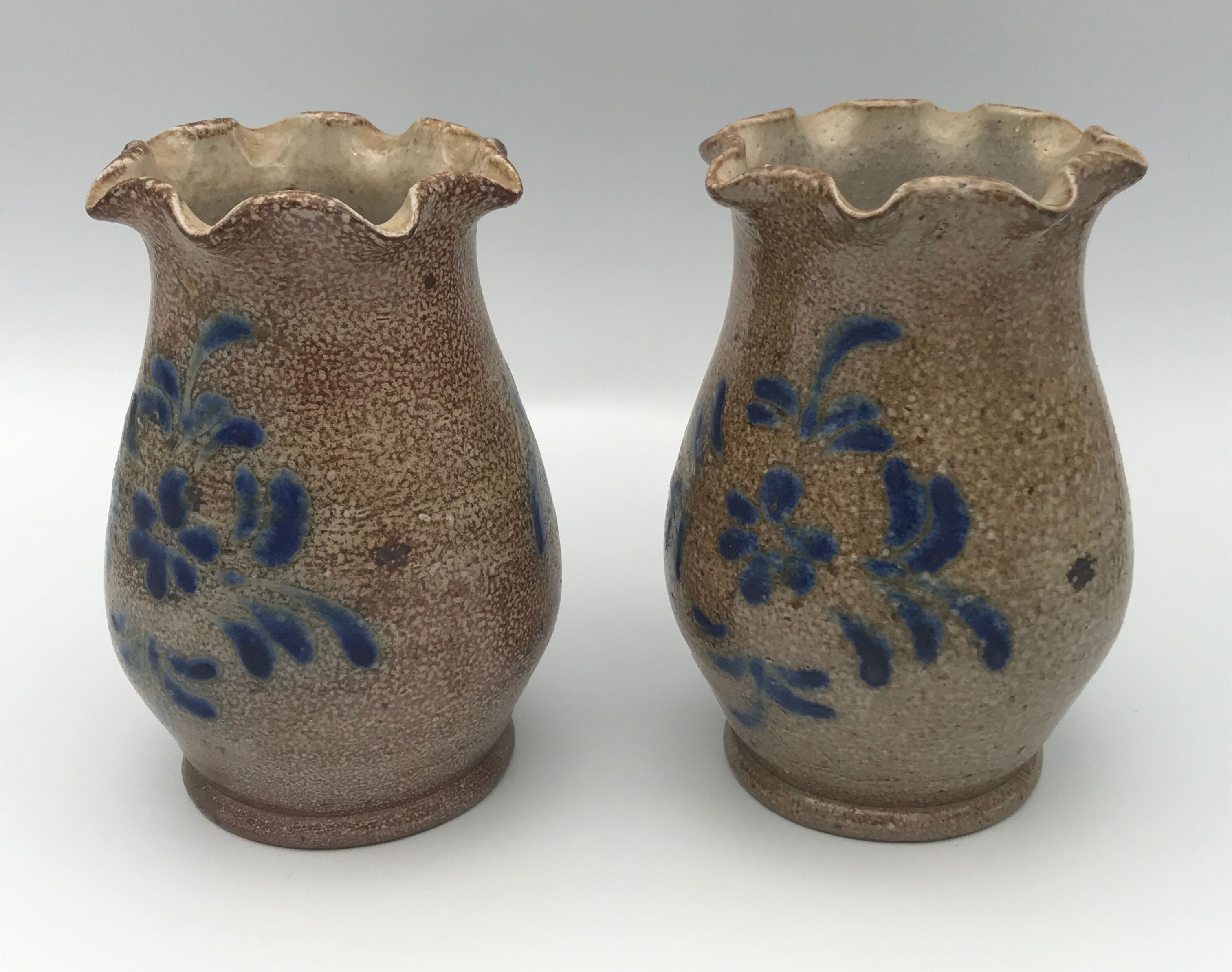 Pair of vintage pottery vases with floral decoration and glaçureau sel