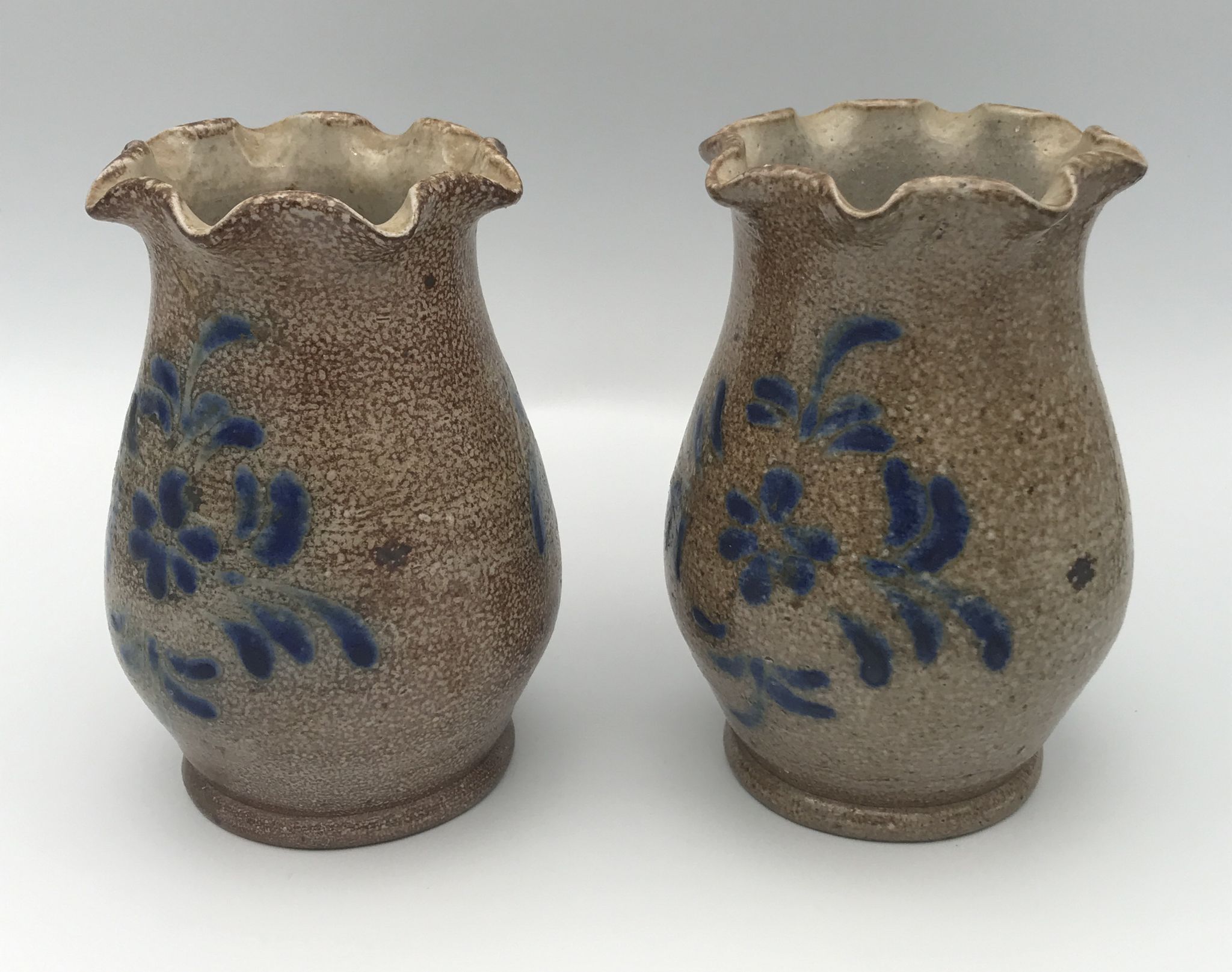Pair of vintage pottery vases with floral decoration and glaçureau sel