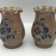 Pair of vintage pottery vases with floral decoration and glaçureau sel