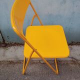Orange vintage folding chairs