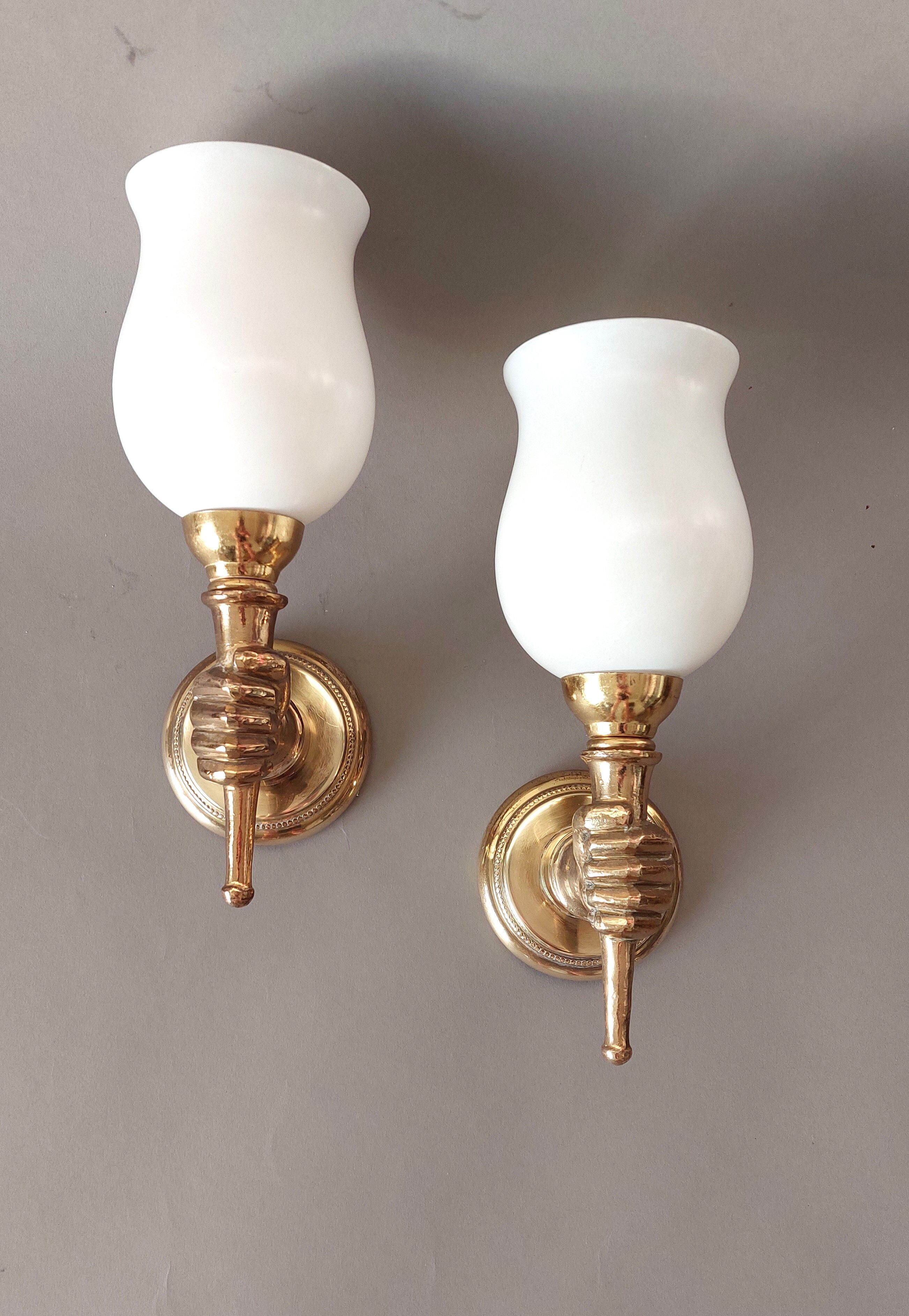 Pair of bronze and gilded brass sconces by John Devoluy 1950.