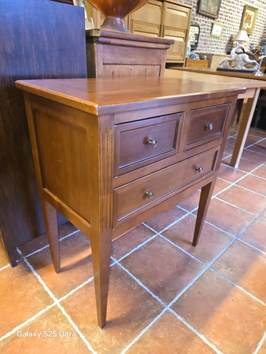 Louis XVI style commode in solid cherry wood.