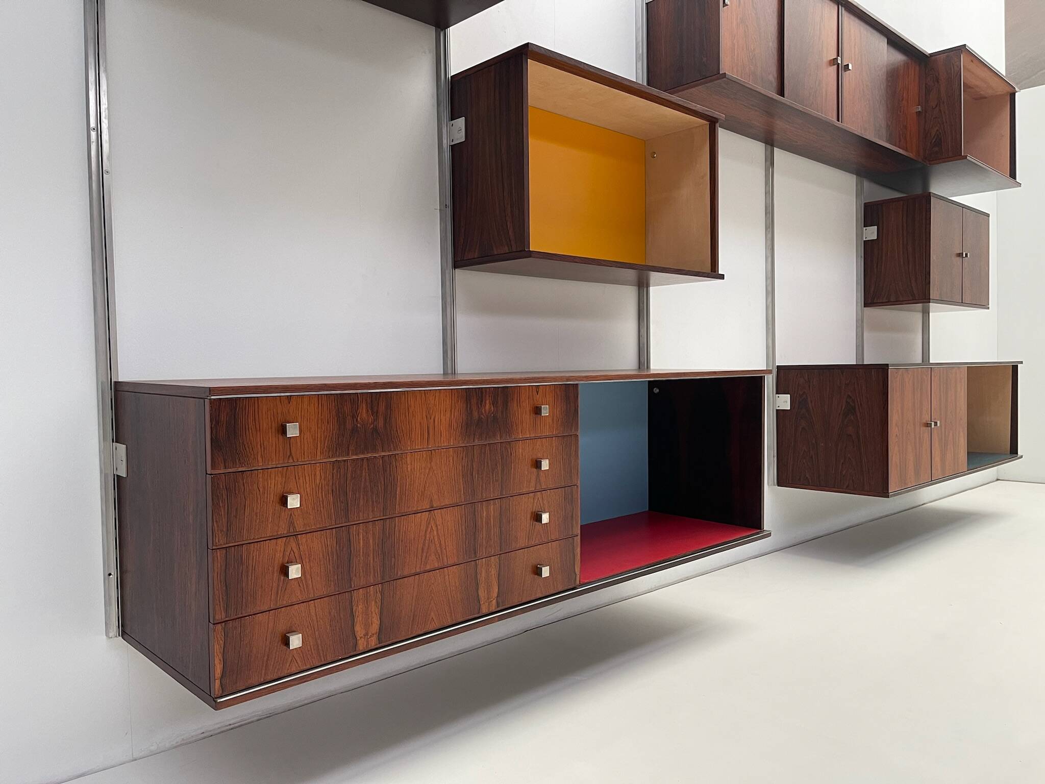 Large colorful wall unit in luxury wood