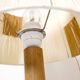 Wooden candle holder mounted as a lamp and its rope shade, 47.5cm.