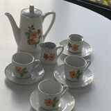 Dinette en porcelaine pour poupées composee d une cafetière, tasses et soucoupes, vintage