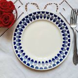 Old mismatched earthenware dinner plates