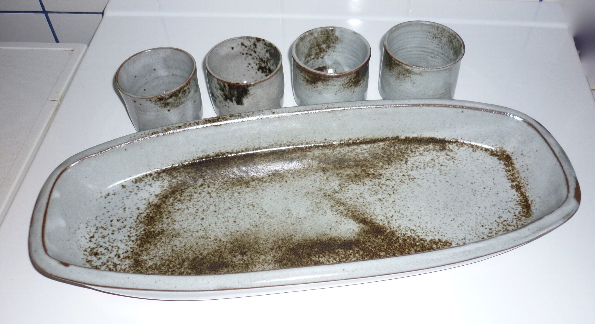 Ceramic fish dish and 4 pots for sauces from the 1960s