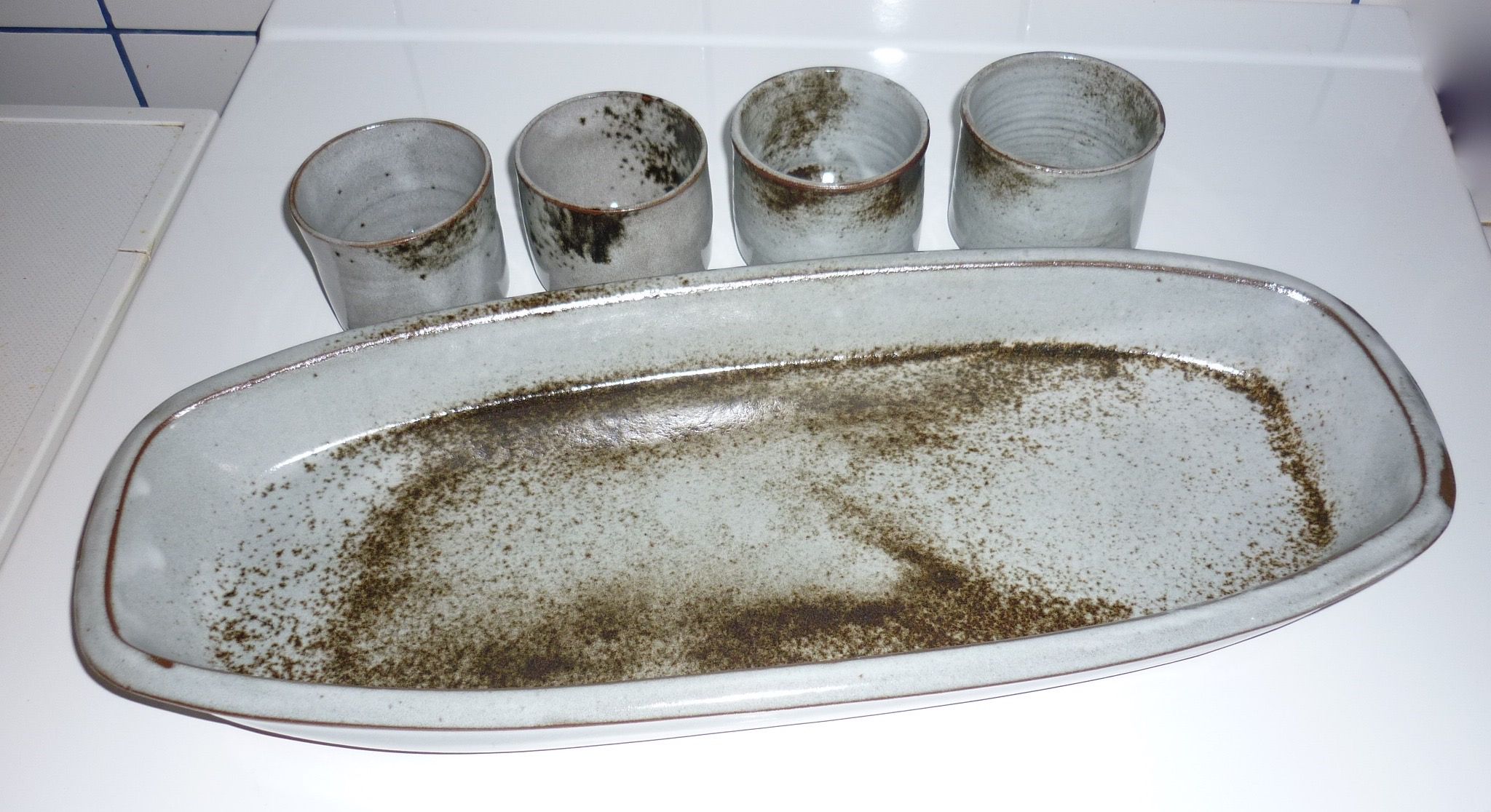 Ceramic fish dish and 4 pots for sauces from the 1960s