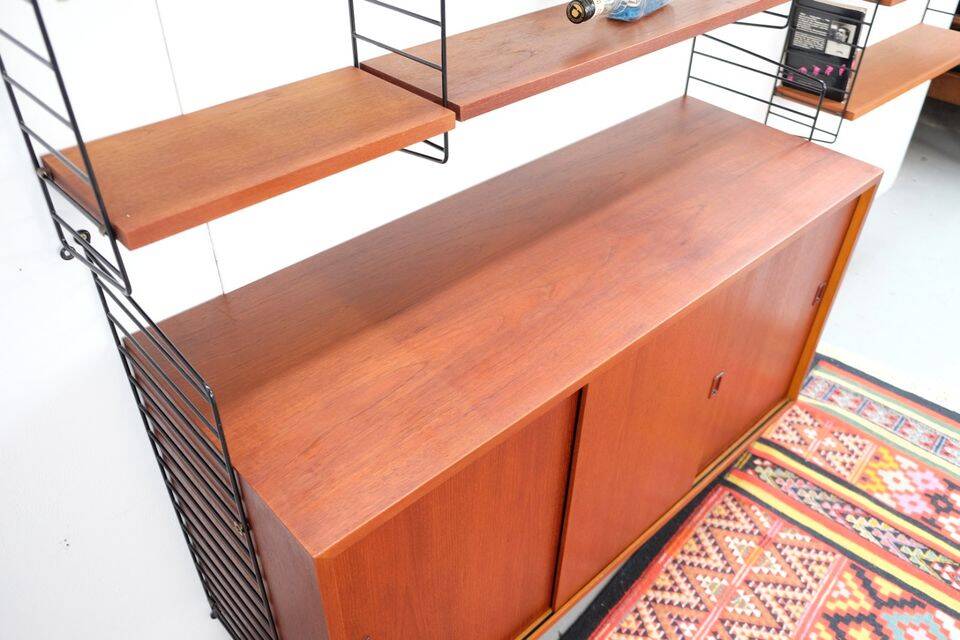 Nisse String shelf in teak, retro vintage style from the 60s-70s.