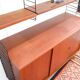 Nisse String shelf in teak, retro vintage style from the 60s-70s.
