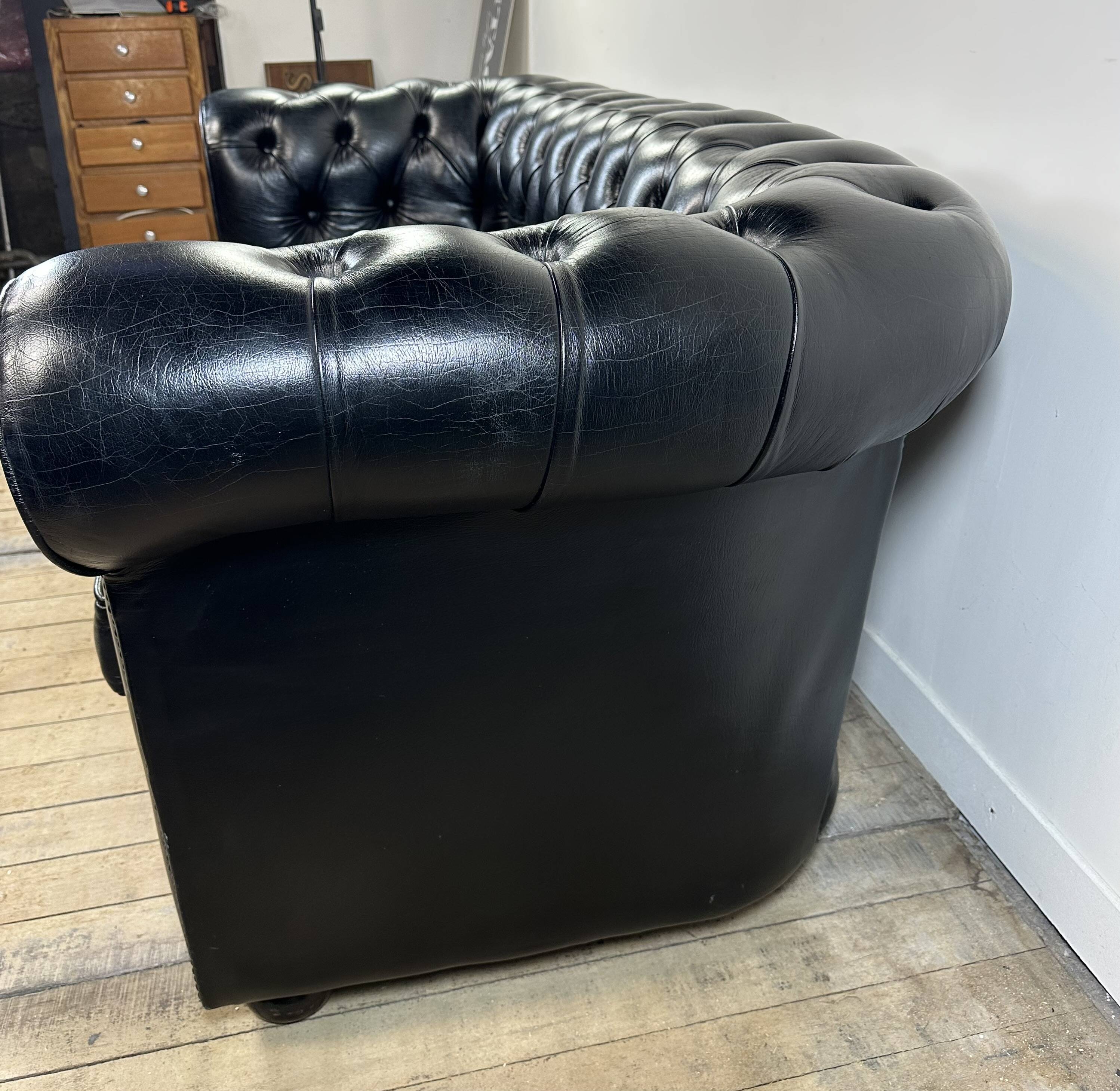 Vintage 1980 black leather Chesterfield sofa