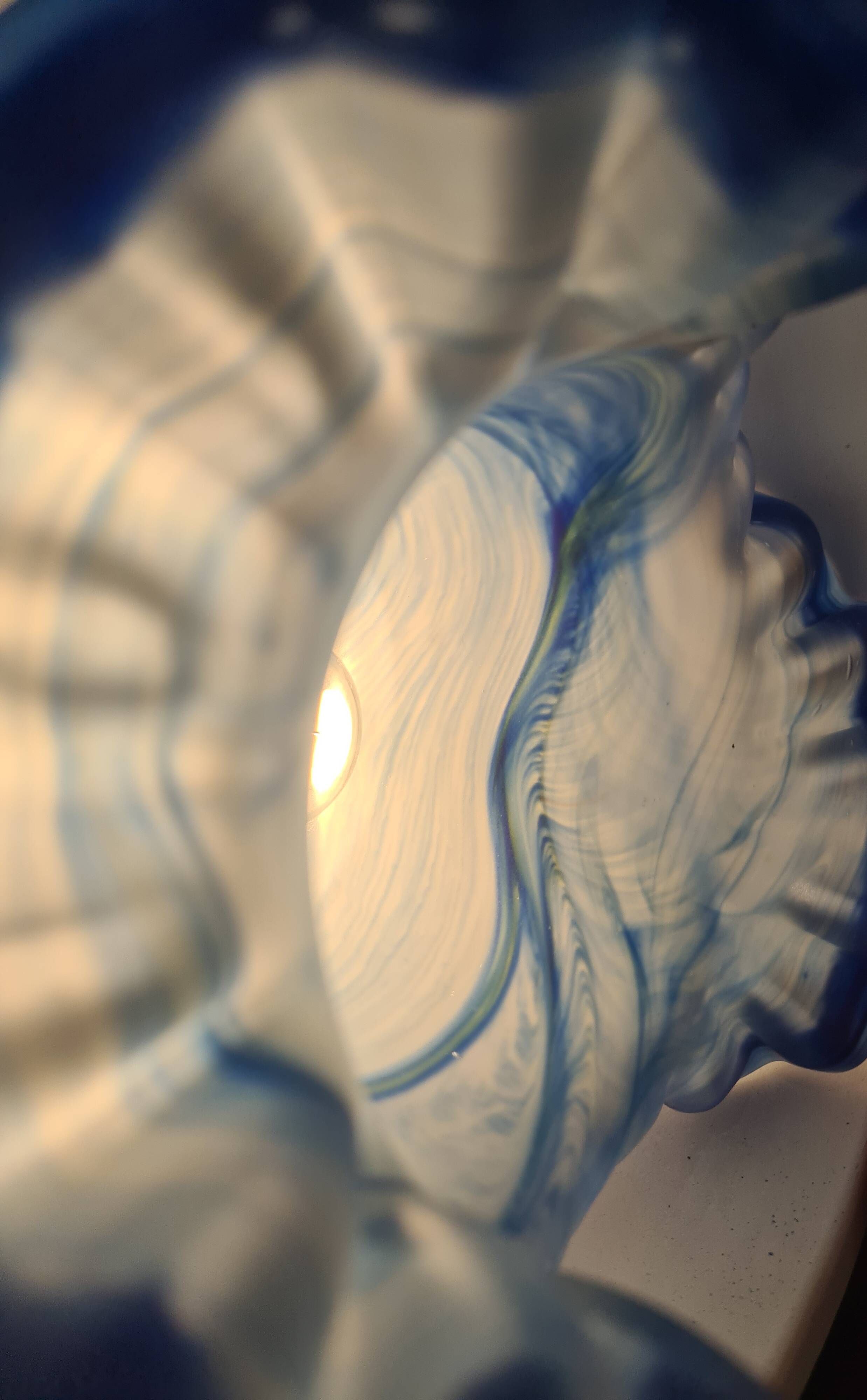 etched brass lamp with a blue satin glass tulip shade, signed Vianne 36x16