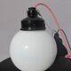 Trio suspensions globes verre opalin et bakélite