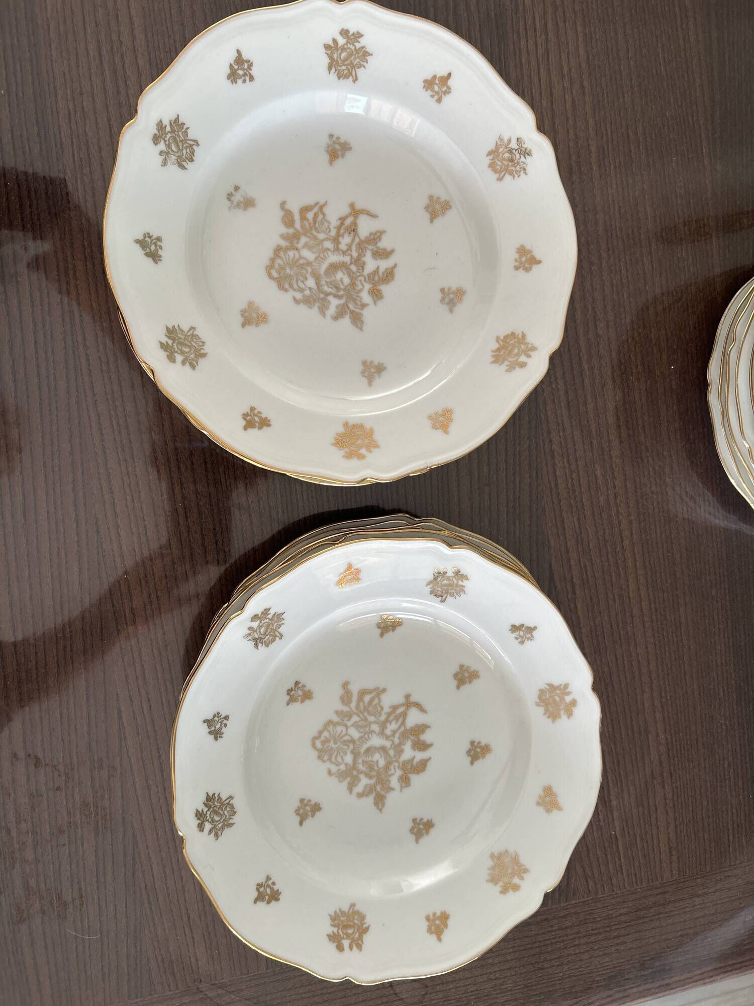This white porcelain plate features a scalloped edge and elegance.