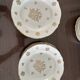 This white porcelain plate features a scalloped edge and elegance.