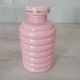 Set of pink and gold ceramic bathroom accessories