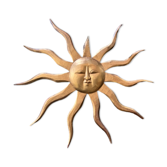 Large decorative sun in gilded wood