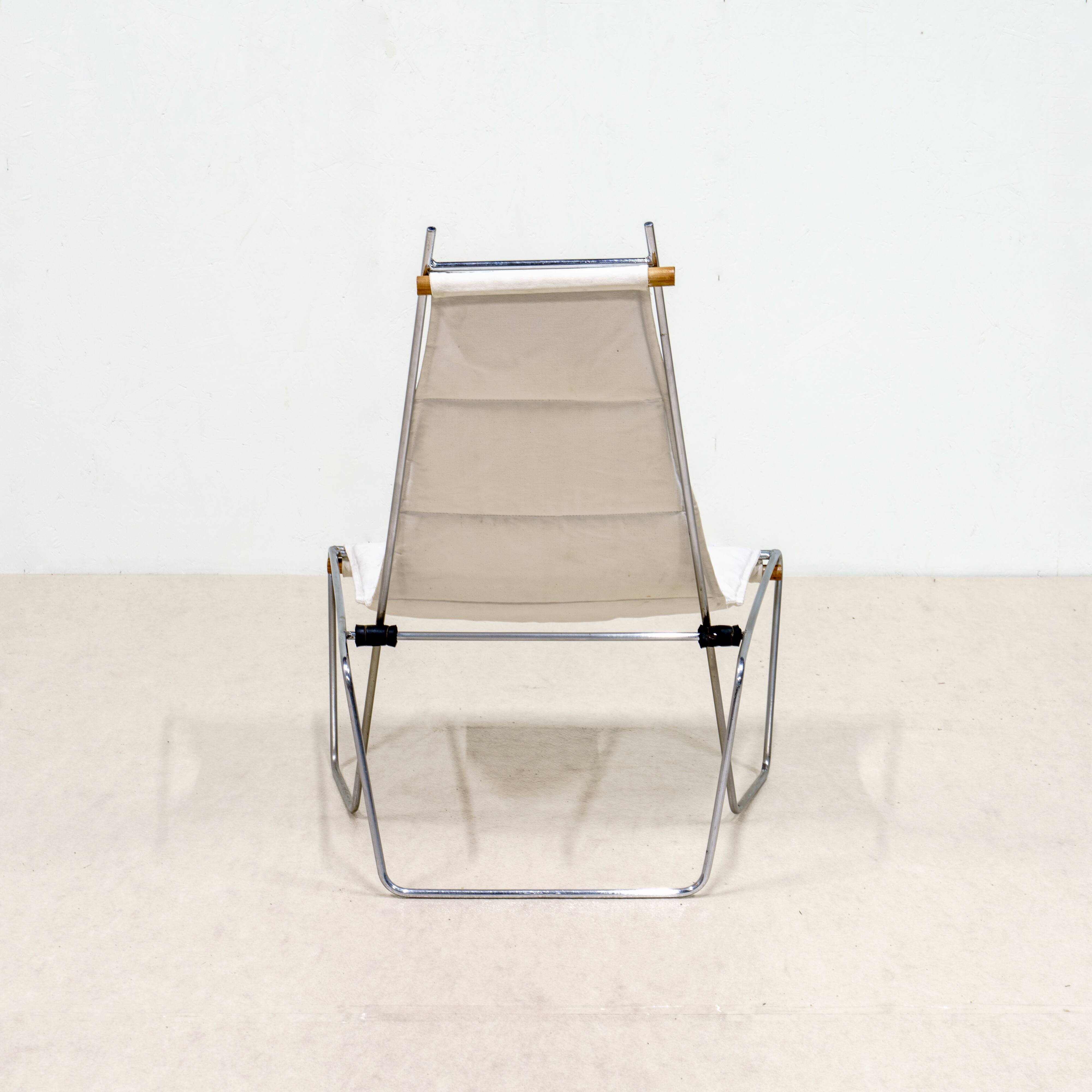 A pair of low chairs. France 70s