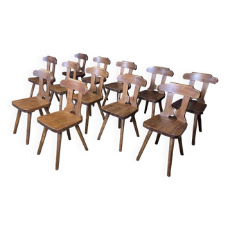 Set of 12 carved wooden chalet chairs from the 60s France