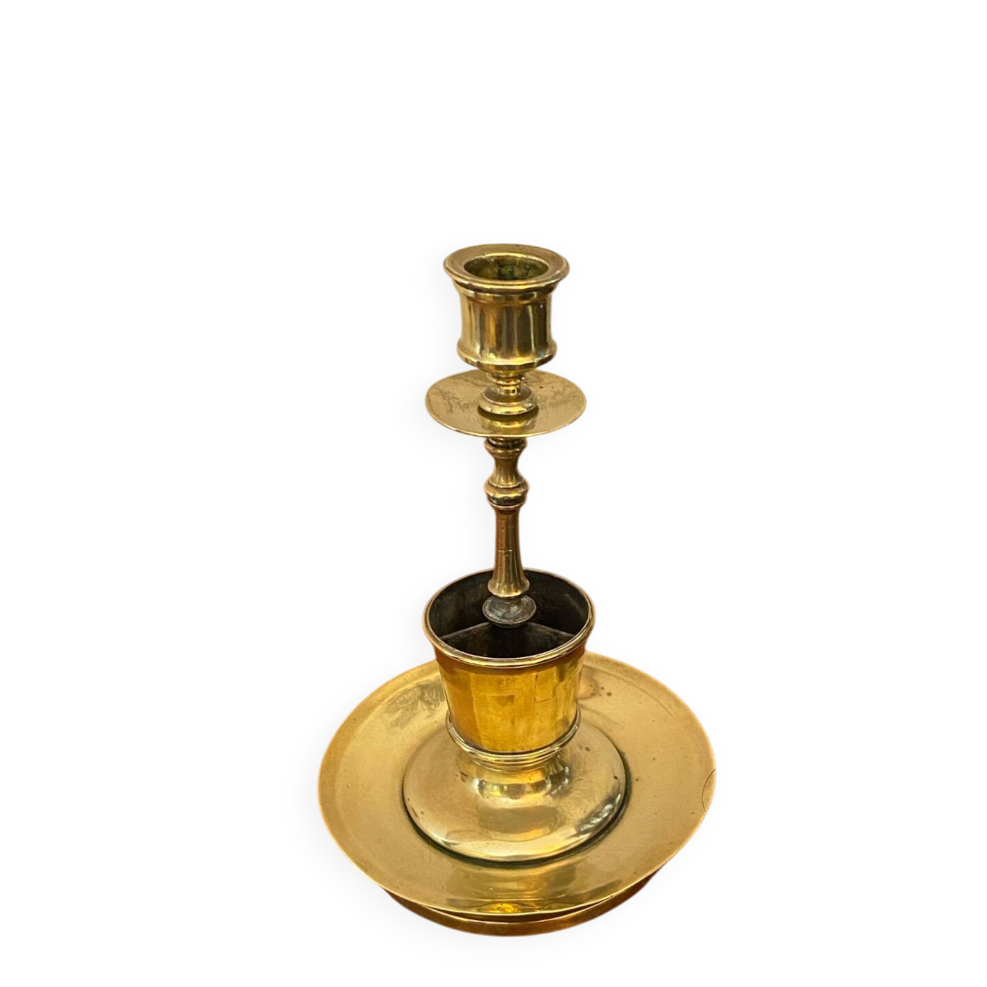 Compartmentalised brass candlestick
