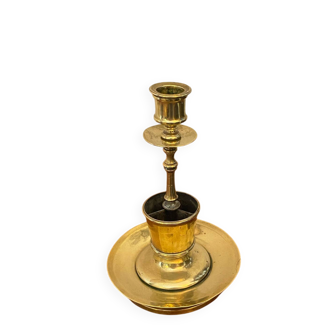Compartmentalised brass candlestick