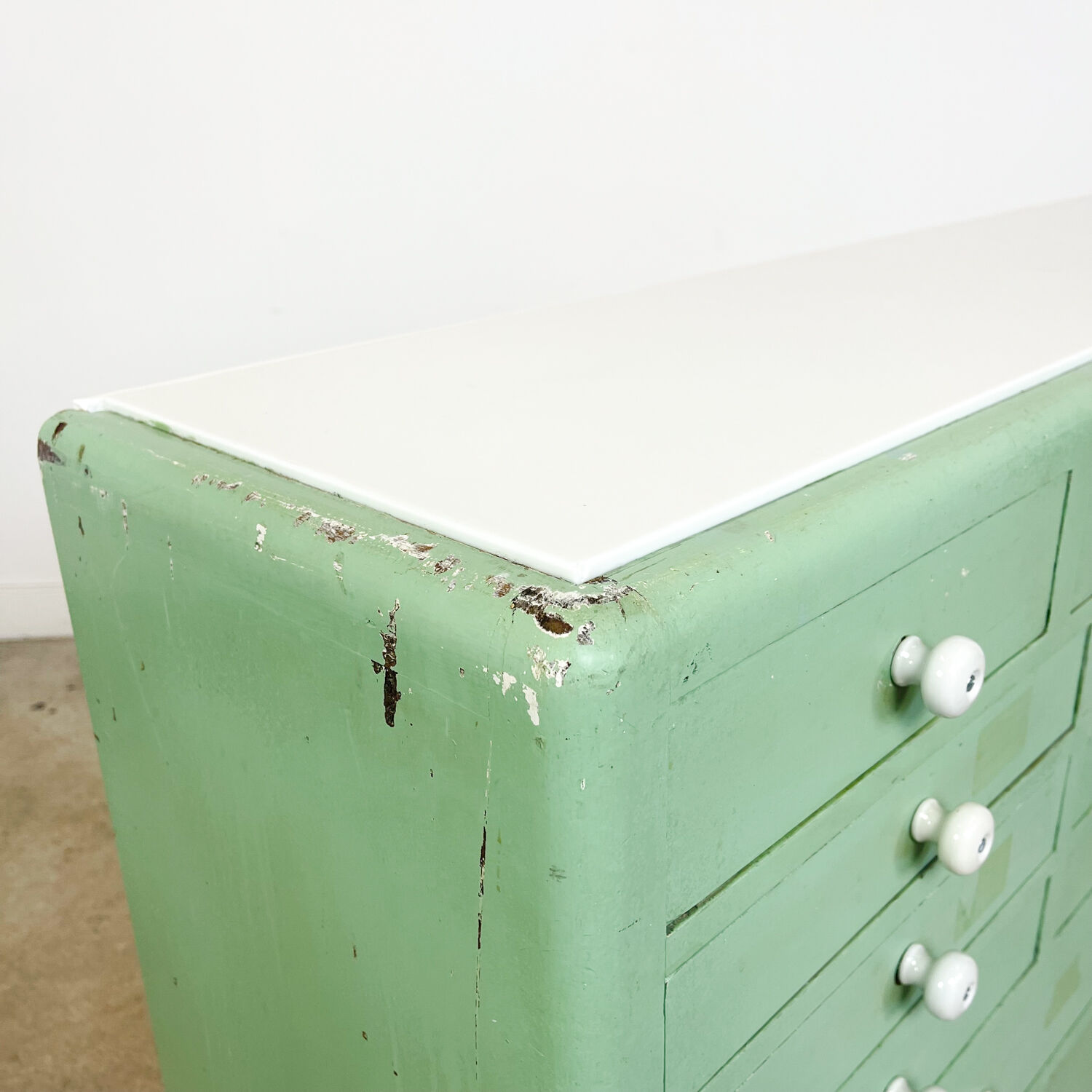 Vintage mint green dentist drawer unit with opaline glass top
