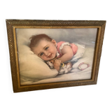 Old frame with a baby