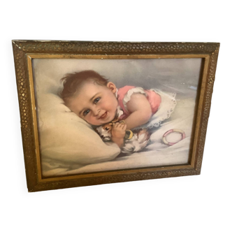 Old frame with a baby
