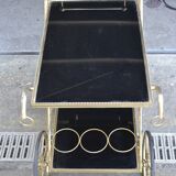 Rolling cart in brass and smoked glass