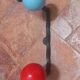 Vintage wall coat rack "Atomic" in wrought iron with multicoloured balls.