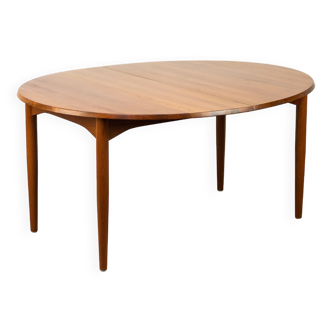 Danish oval solid teak dining table with extensions, 1960s