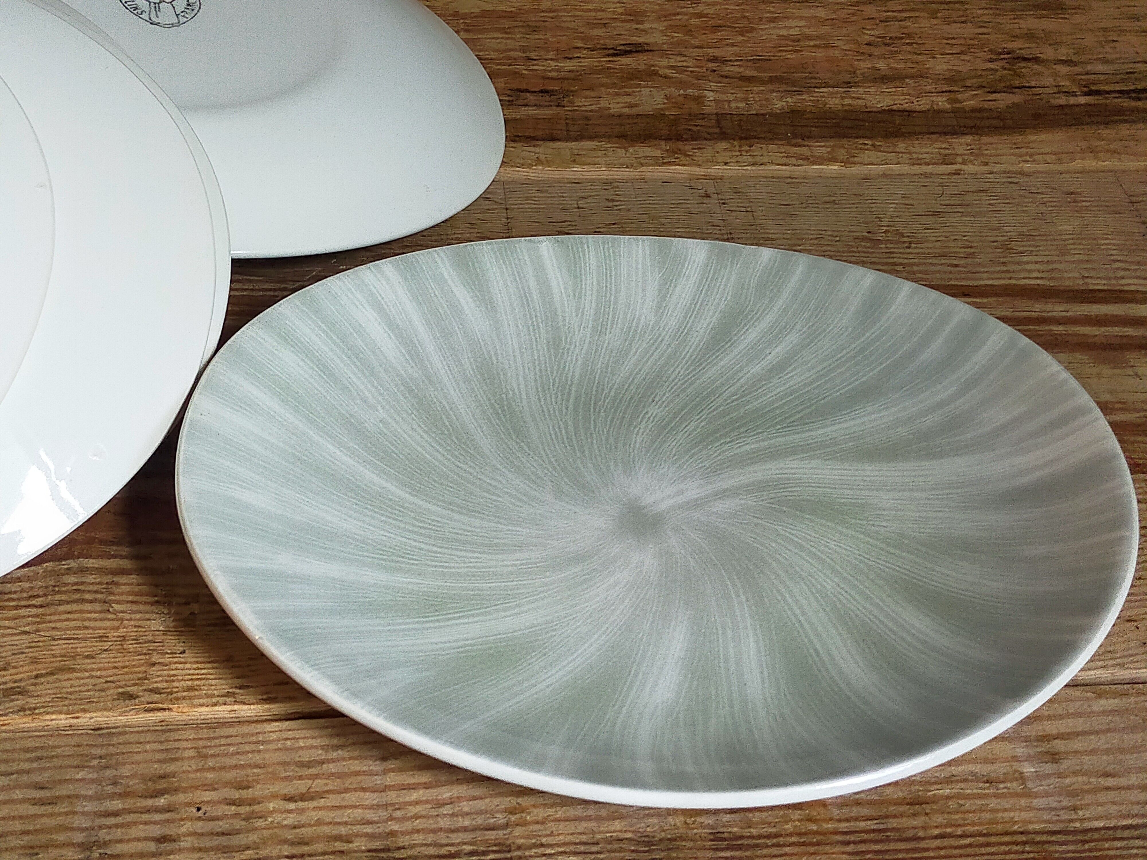 Nine earthenware plates from Salins-les-Bains vintage