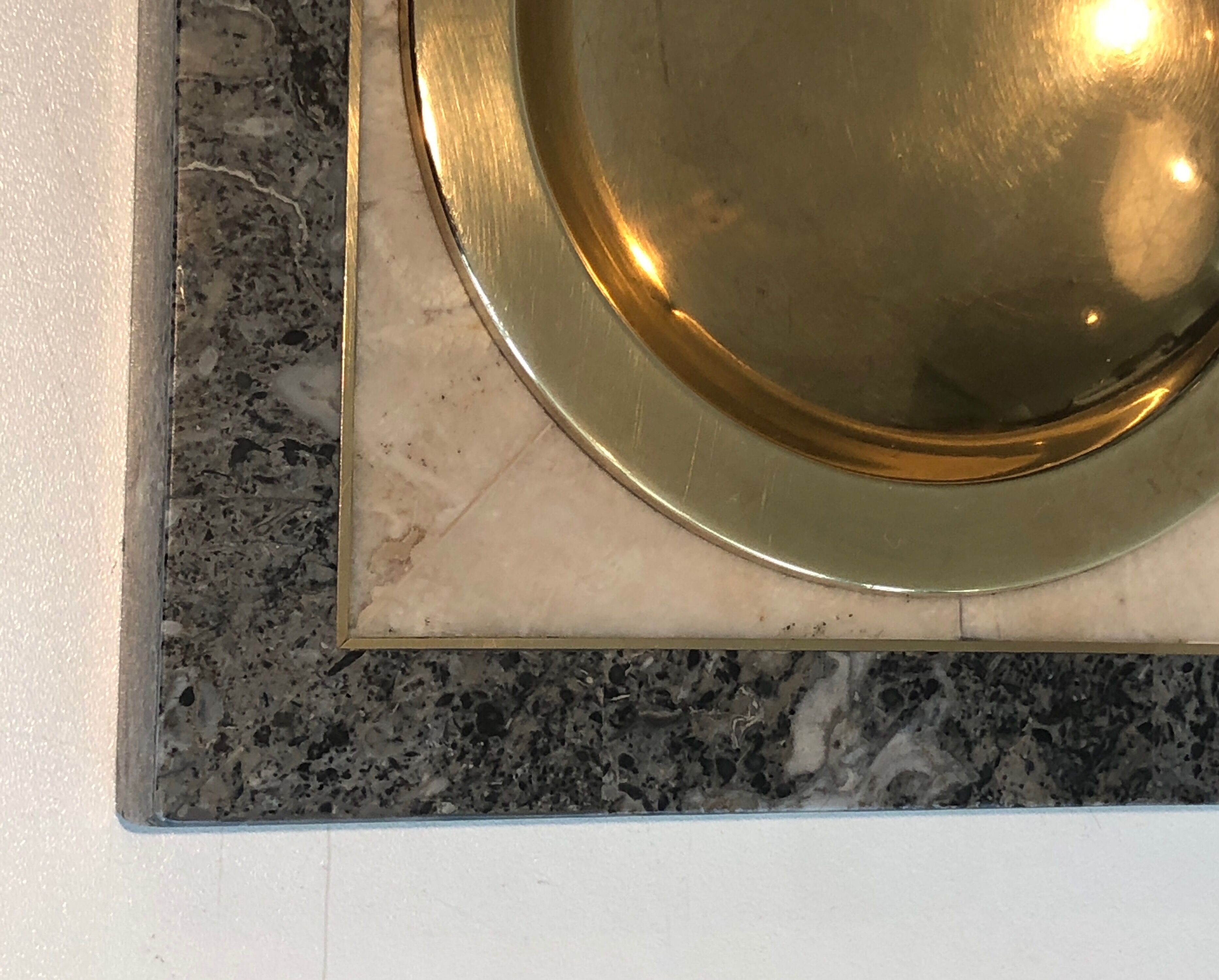 Neoclassical style pocket empty in faux-marble and brass. french work. around 1970