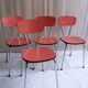 Suite de 4 chaises en formica rouge
