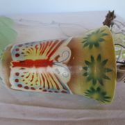 "Very old light fixture" with a "rise and fall" counterweight adorned with butterflies.